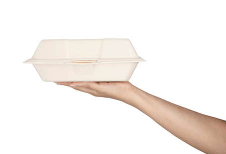Hand wit Beige natural plant fiber disposable solated on white background