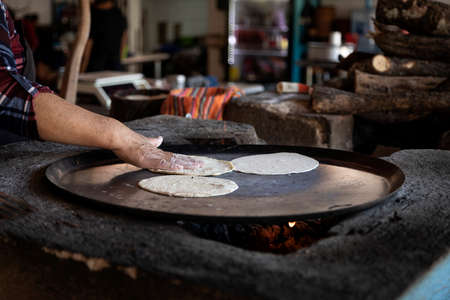 Food preparation in a typical country restaurant of Mexican food.の写真素材