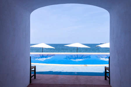 View of desolate beach hotel without guests due to COVID-19 pandemic quarantine.