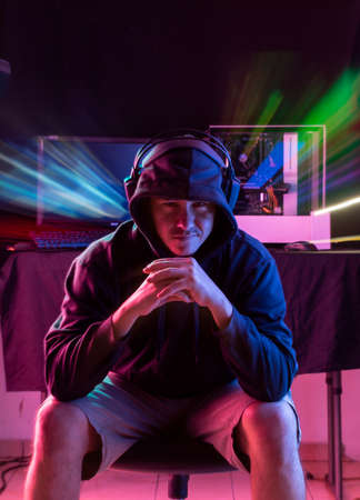 Expression session. Young man playing videogames with different facial expressionsの写真素材