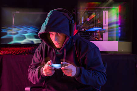 Expression session. Young man playing videogames with different facial expressions