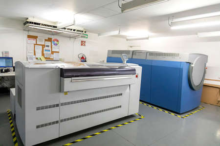Close up of an offset printing machine during production