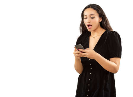 expression and people concept - surprised woman with cell phone funny face over white background....