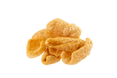 Delicious mexican snack dried chicharron in a white background. Overhead shot