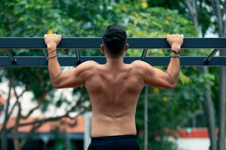 Young man exercising outdoors. Sports lifestyle.の写真素材