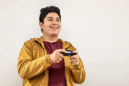 Expression session. Young man playing videogames with different facial expressions