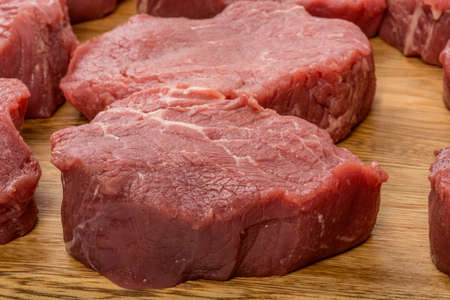 detail of a cutting board with steer steak. gourmet foodの写真素材