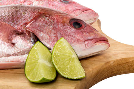 detail of a cutting board with fresh wachinango fish. gourmet foodの写真素材