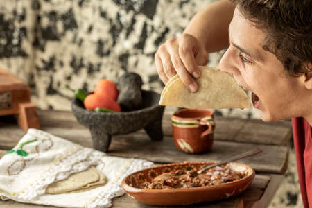 Detail of a typical mexican breakfast. delicious plate of birriaの写真素材