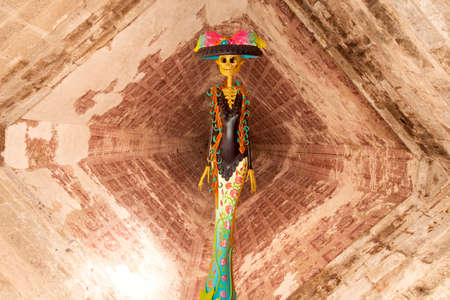 Craft of catrina. Mexican female character to commemorate the day of the dead in Mexico Abstract...