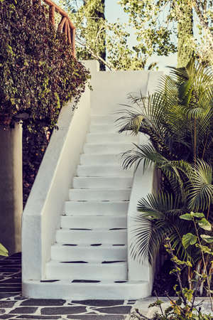 detail of a stairs to a spa and massage with buddhist decoration; house of relaxation