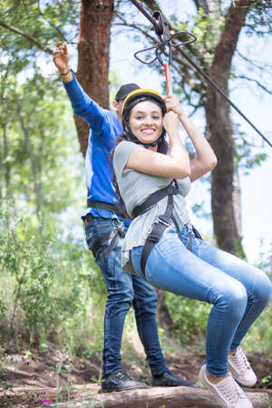 happy young woman pulled from the zip line in Mazamitlaの写真素材