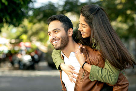 Couple in love. Enjoying happy in public park