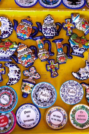 Various crafts in typical Mexican market.の写真素材