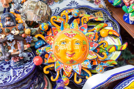 Various crafts in typical Mexican market.の写真素材