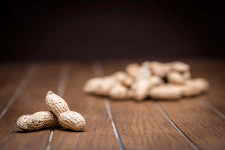 Close up texture of peanuts with peelの写真素材