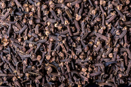 Close up texture of cloves in a pileの写真素材