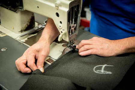 Man hands working in furniture wood industry