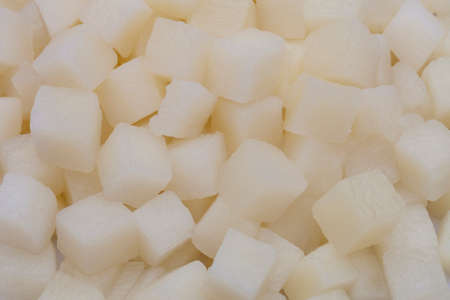 Texture detail of cut potatoes in boxesの写真素材