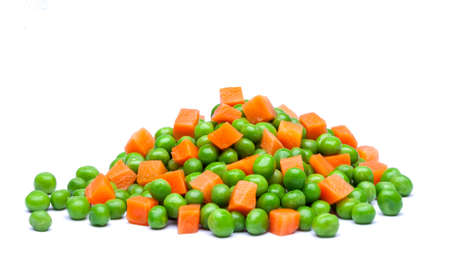 Green chicks and carrots in boxes with shadow on white backgroundの写真素材