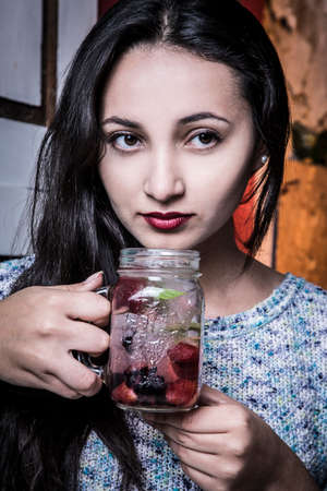 Beautiful woman with smile, eating at old restaurants