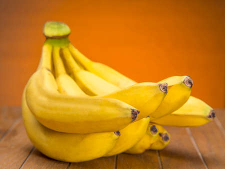 Fresh banana on wooden boardの写真素材