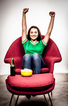 Young Man Shouting and feasting. Full of joy and excitementの写真素材