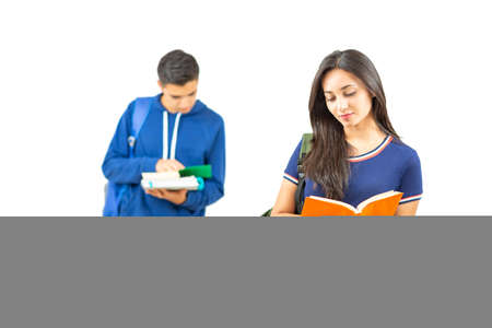 Young latin students studying standing on white backgroundの写真素材