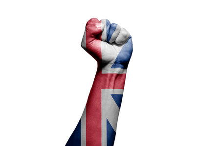 Strong man's hand in battle signal with England flag on white background.の写真素材