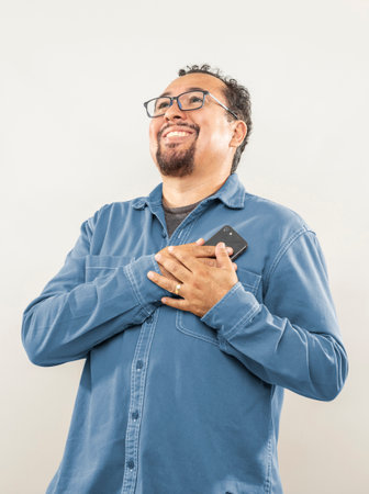 middle aged man in denim topper making multiple expressions and poses on white background
