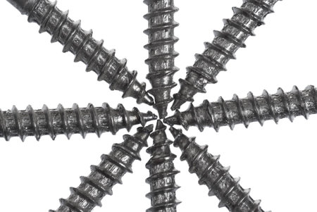Close up of assorted nuts and bolts arranged in a circleの写真素材