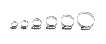 heap of metal clamps of different sizes for pipe on a white background arranged in different compositionsの写真素材