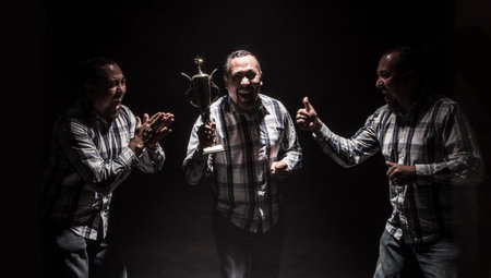 middle aged man in denim topper making multiple expressions and poses on white backgroundの写真素材