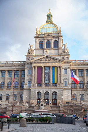 Front facade of the historic and famous National Museum in Prague during a beautiful cloudy afternoonの写真素材