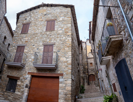 alley between houses in Rupit, a beautiful medieval village in Spain preserved to this day as a tourist destinationの写真素材