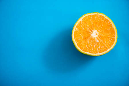 Orange on blue backgroundの写真素材