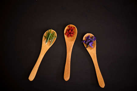 spices on spoonの写真素材