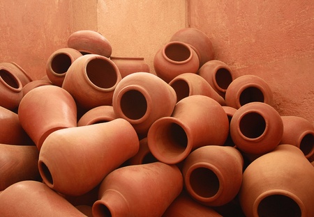 Clay pots stacked in pottery shop - Clay pots stacked in pottery shop, Horizontal composition with copy space の写真素材