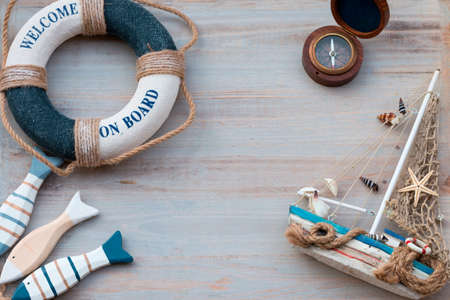 Copy space with lifebuoy, fish and boat. Marine life. Vacation on the sea.の写真素材