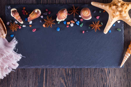 Traditional Belgian shell shape on black background. Candy in form of seafood.の写真素材