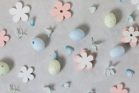 easter decoration. Pastel colorful Easter eggs on light gray background, top view.の写真素材