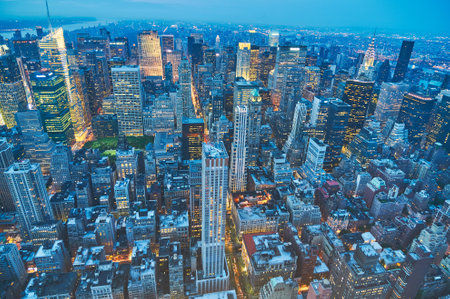 Wide blue hour shot over a big city illuminated