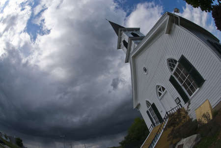 church under stormy skiesの写真素材