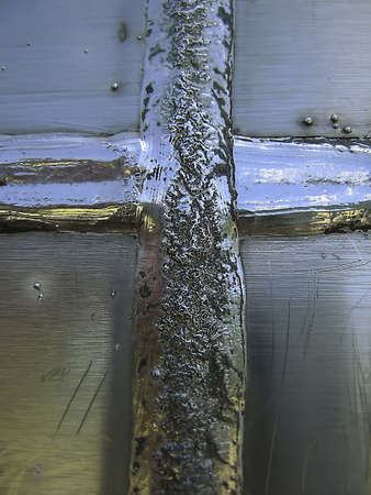 cross weld on plates of steelの写真素材