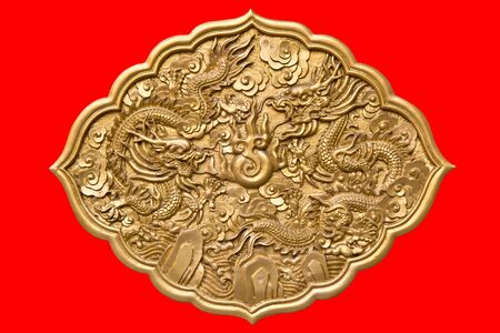 Chinese golden twin dragons on red background の写真素材