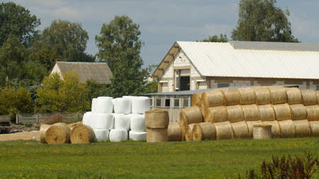 Ecological Farmhouse - Barn and bales of straw. High quality photoの写真素材