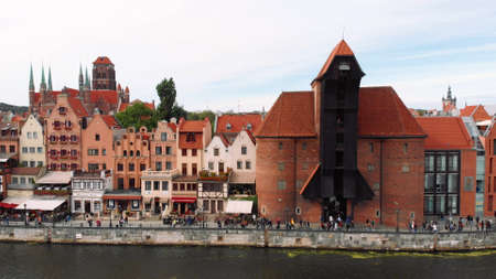 Gdansk, Poland 09.15.2019 Crane - Motlawa River - St Marys church behind. Aerial photo