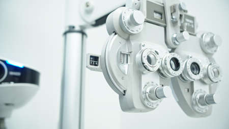 Eye clinic with autorefractor , slit lamp and eye diagnostic tools. High quality photoの写真素材
