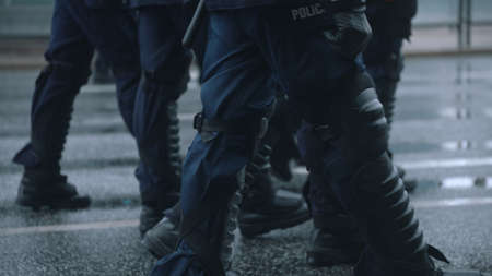 Warsaw, Poland 13.10.2020 - Protest of the Farmers Police boots marching on the street.のeditorial素材
