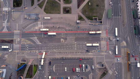 Warsaw, Poland 03.16.2020 High angle view of multilane streets crossing in low traffic hour. Drone...